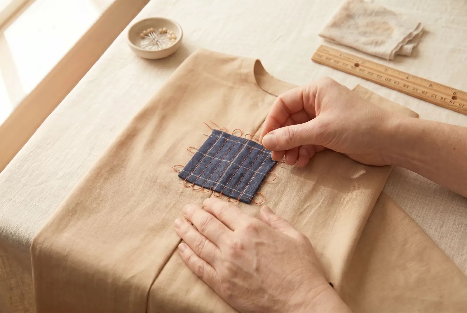 Photo: Keep the work flat and leave each row slightly slack — after finishing a row, smooth the patch and leave about 3 mm (1/8 in) of ease in the thread, because thr…
