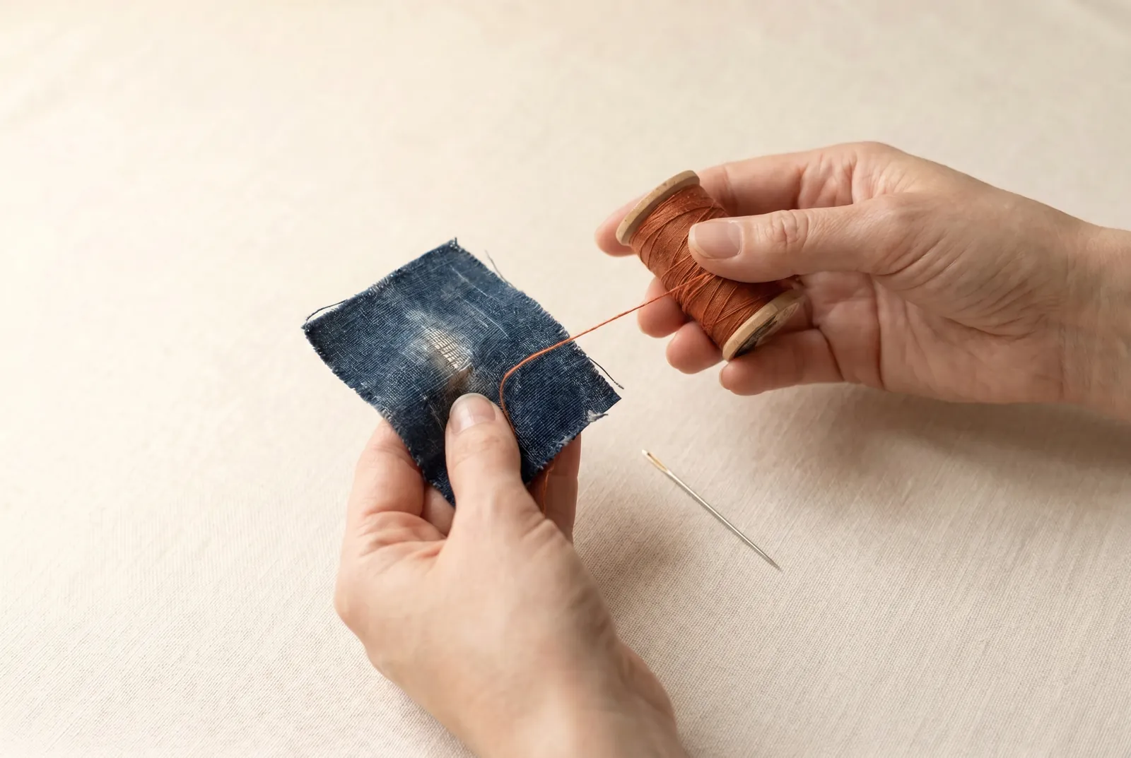 Photo: Choose a darning thread that suits the cloth.