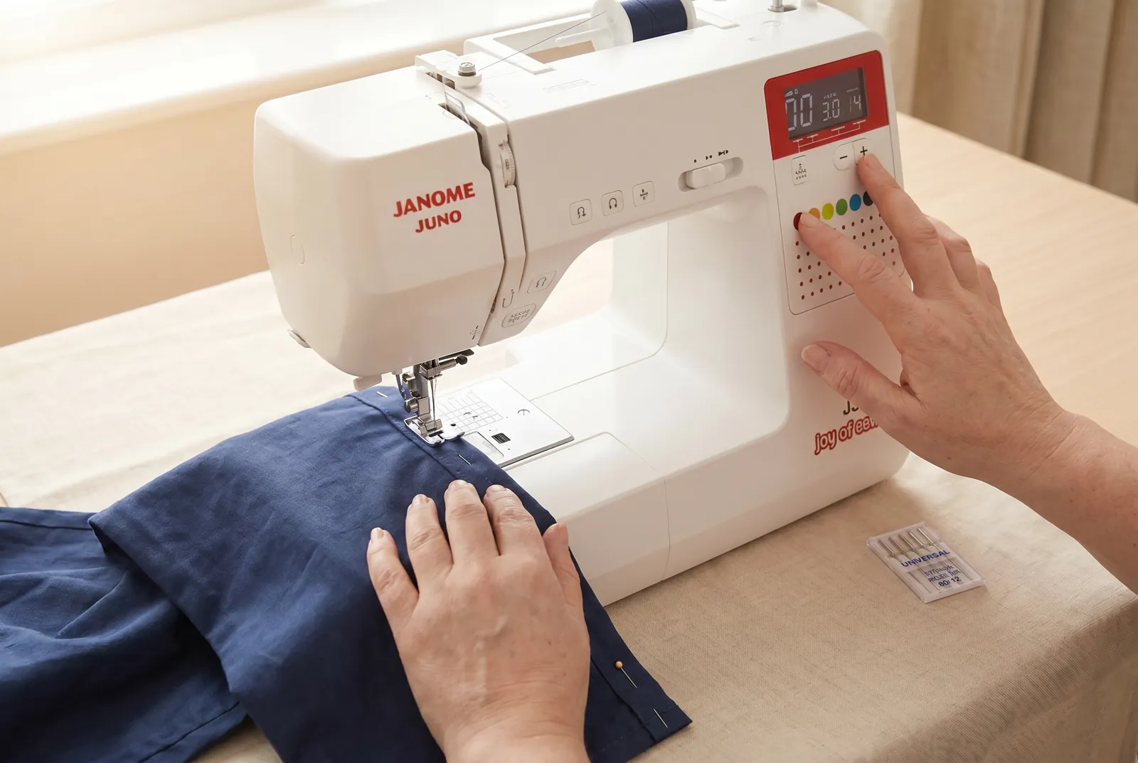 Photo: Thread the machine with polyester thread that matches the trousers, fit a universal 80/12 needle (a 90/14 jeans needle for heavy denim), and set stitch program…