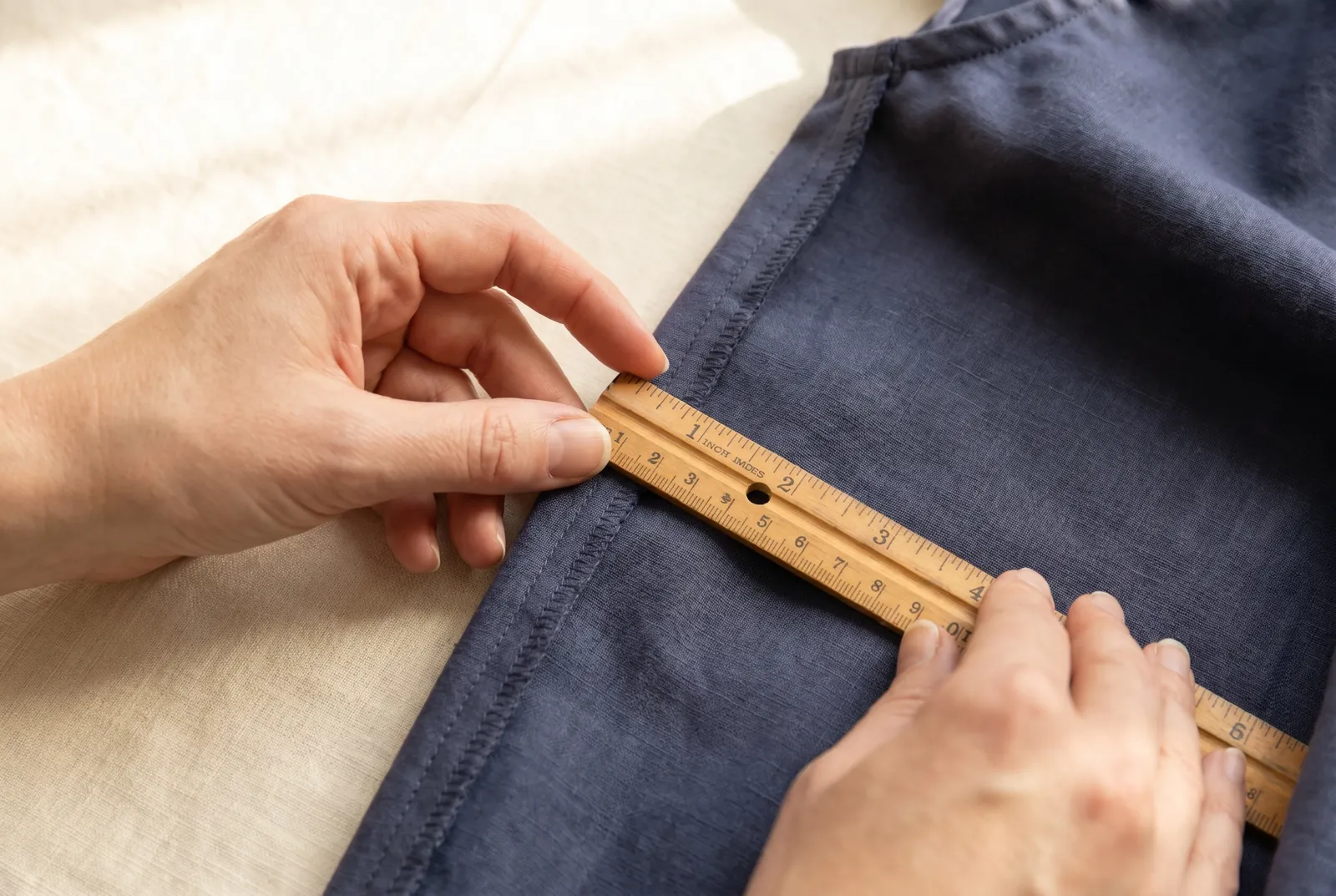 Photo: Turn the garment inside out and find the side seams that run down through the waist.