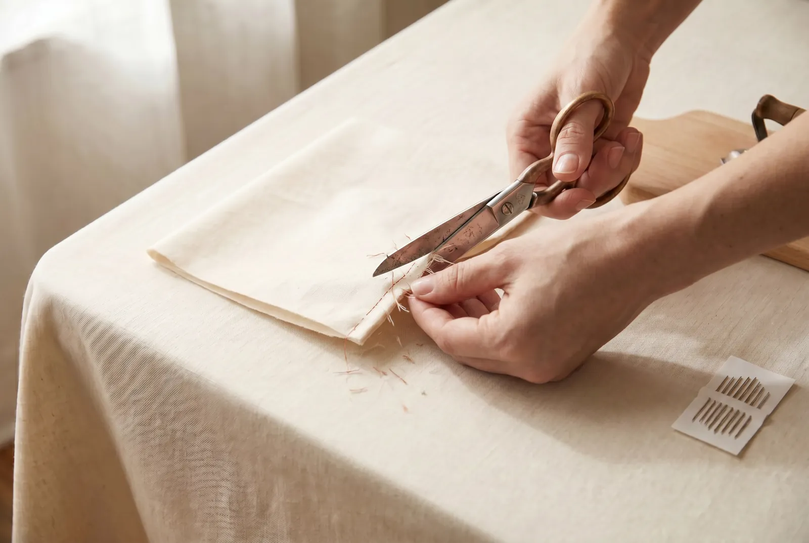 Photo: Trim off the ravelings close to the stitching, cutting away loose threads and any frayed edge.
