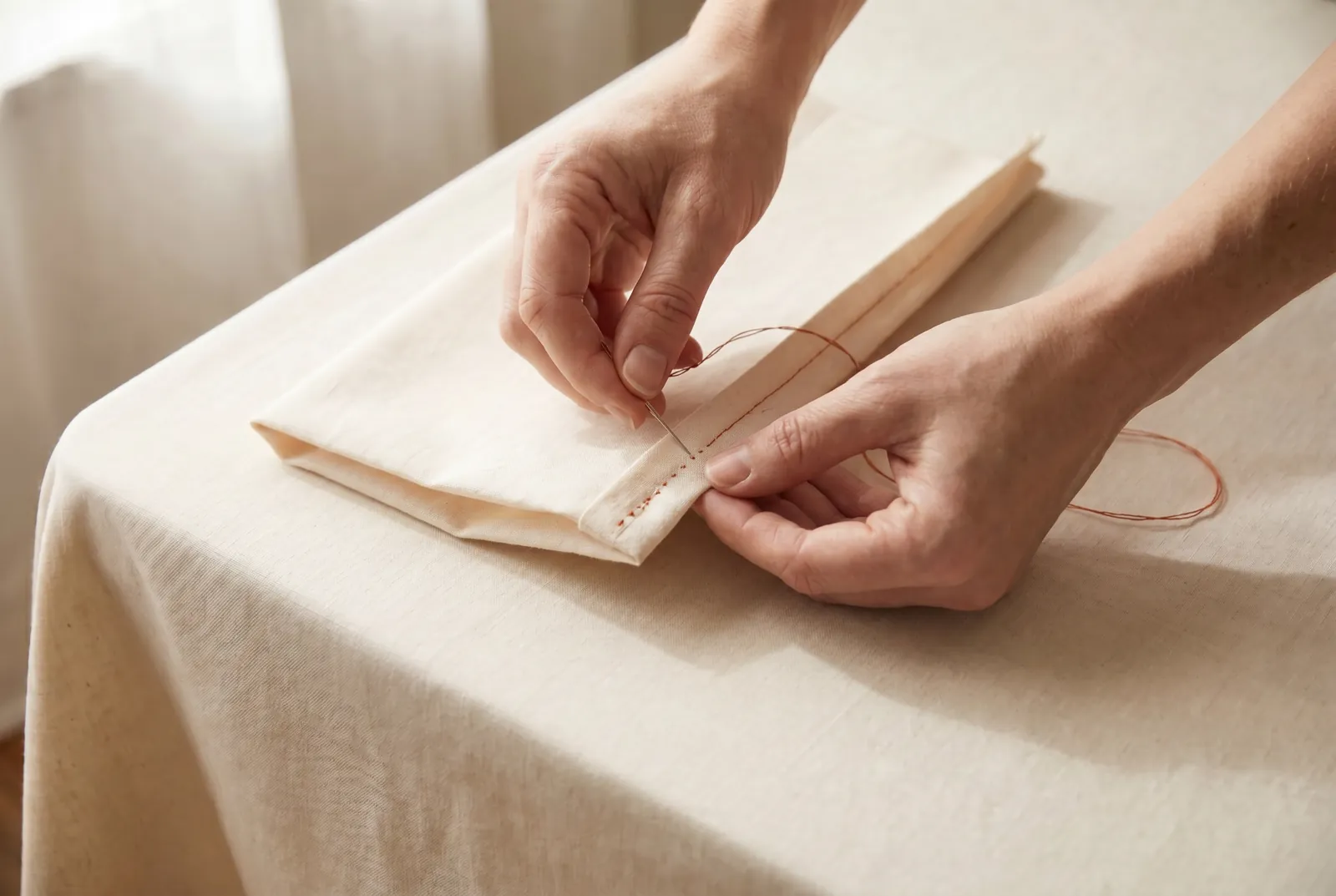 Photo: Stitch the second seam 6 mm (1/4 in) from the fold, deep enough to shut the raw edges entirely inside.