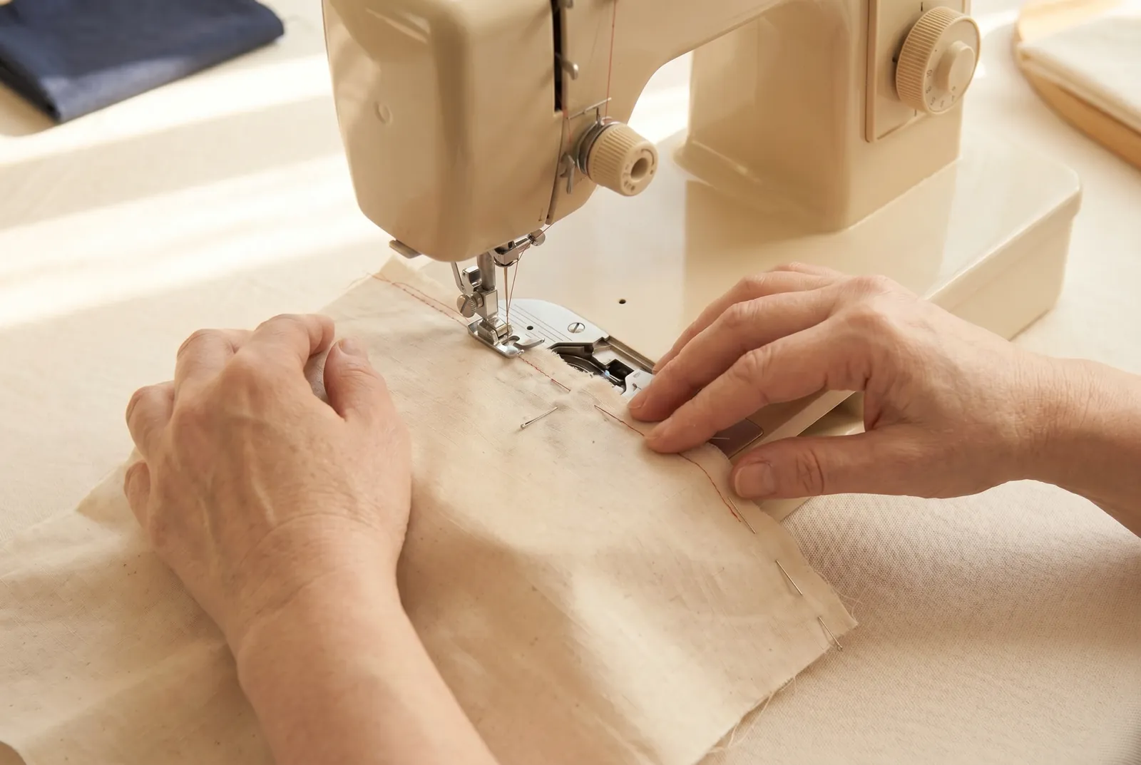 Photo: Stitch a straight line the length of the seam, holding it an even 2 cm (3/4 in) in from the matched edges.